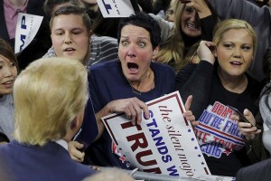 Audience member Robin Roy (C) reacts as U.S. Republican presidential candidate Donald Trump greets her at a campaign rally in Lowell, Massachusetts January 4, 2016. (Brian Snyder/Reuters)